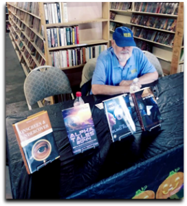Wes Britton signs books